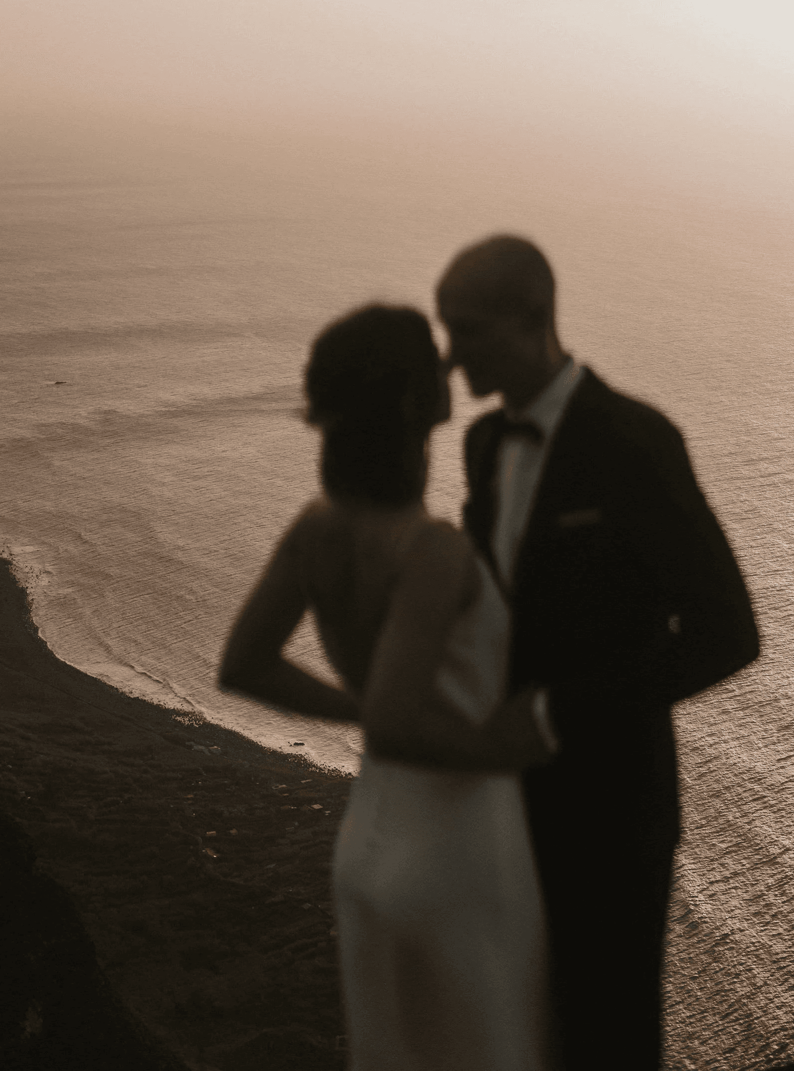 Madeira Elopement couple at sunset with Atlantic ocean coastline