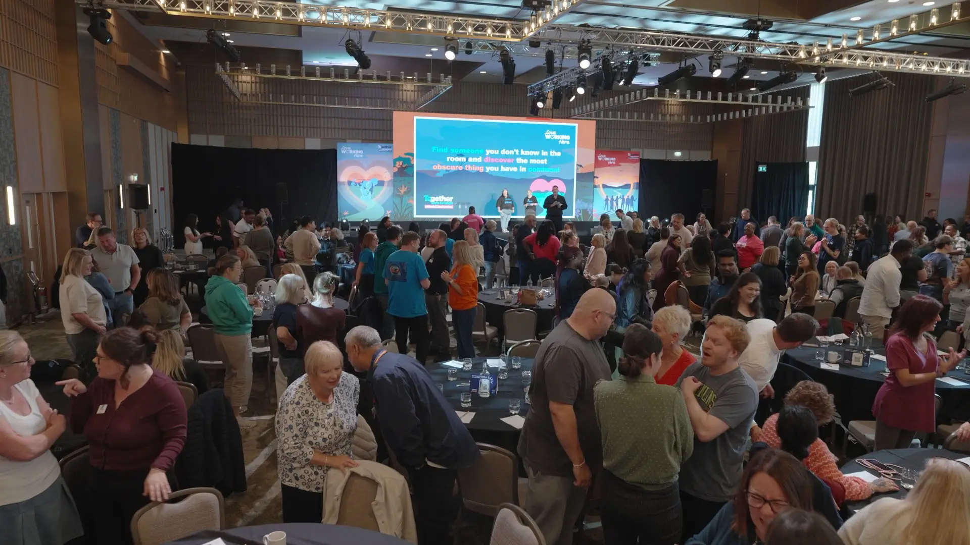 Bupa Care managers networking and taking part in an interactive session during a national leadership event.