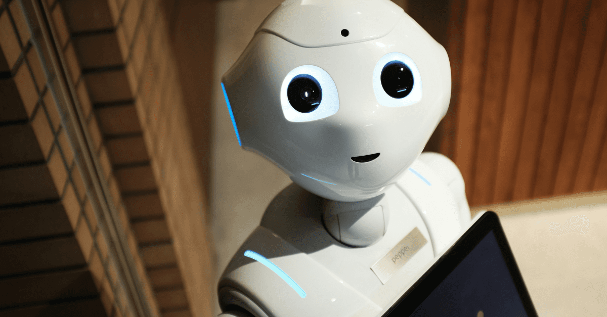 A human-looking robot looking up at the camera