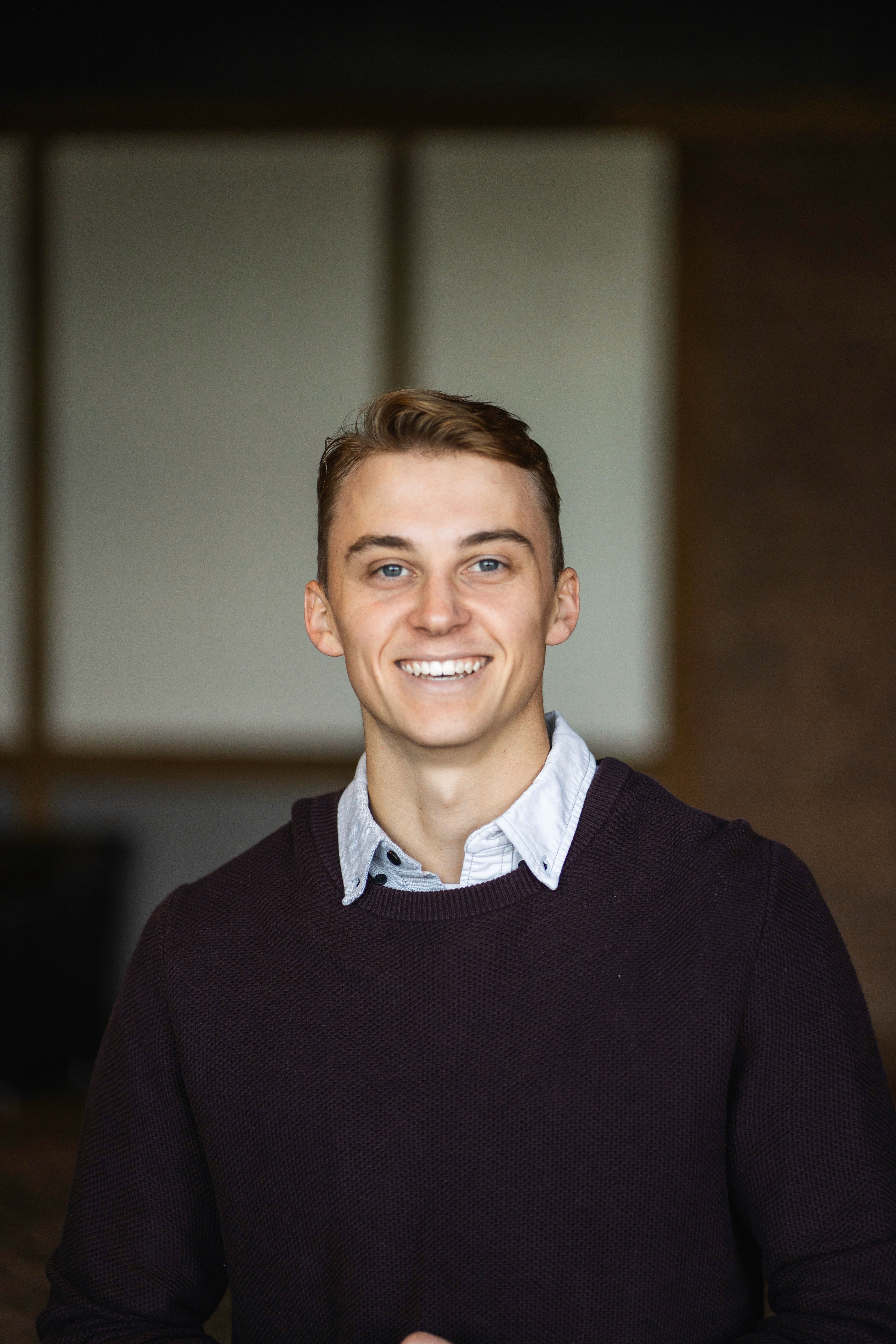 A headshot of Dylan, the founder of Dept.1 Solutions