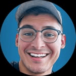 A man in a suit smiling