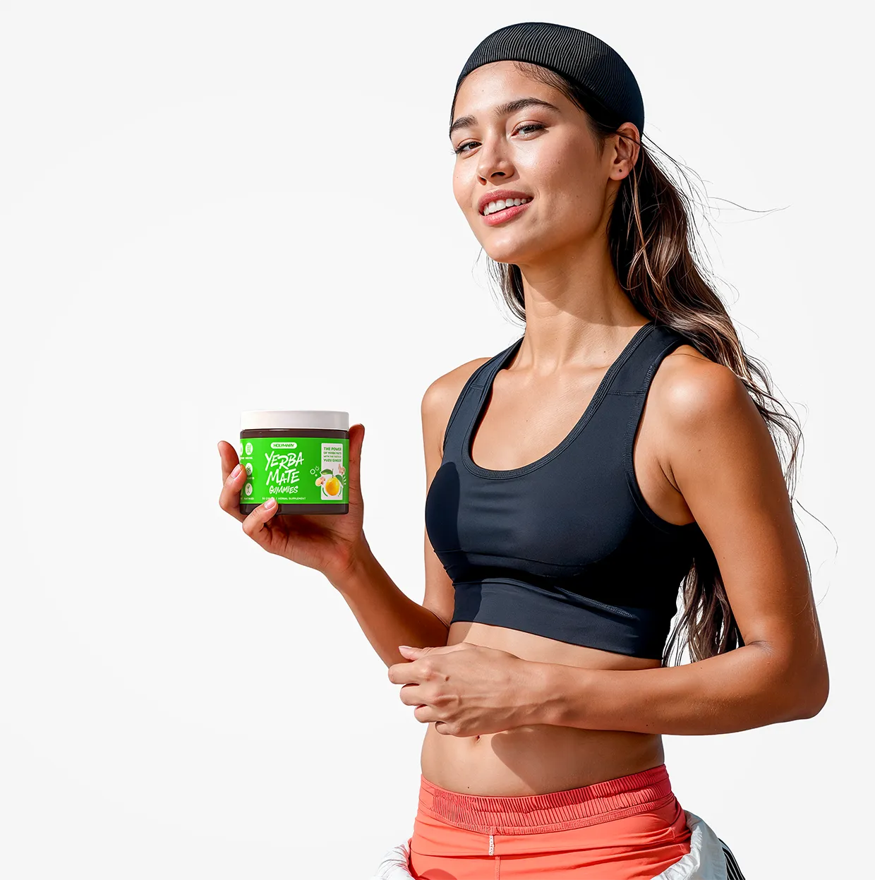 a female holding a jar of gummies