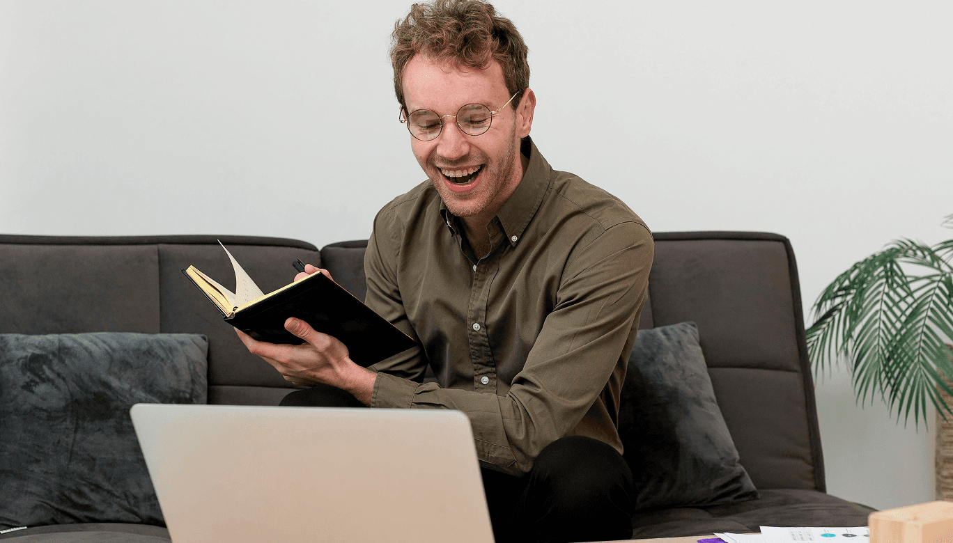 A man works on a laptop