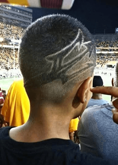 High fade with a pitchfork design, ideal for sports enthusiasts and bold personal expression by Courtney Palmore.