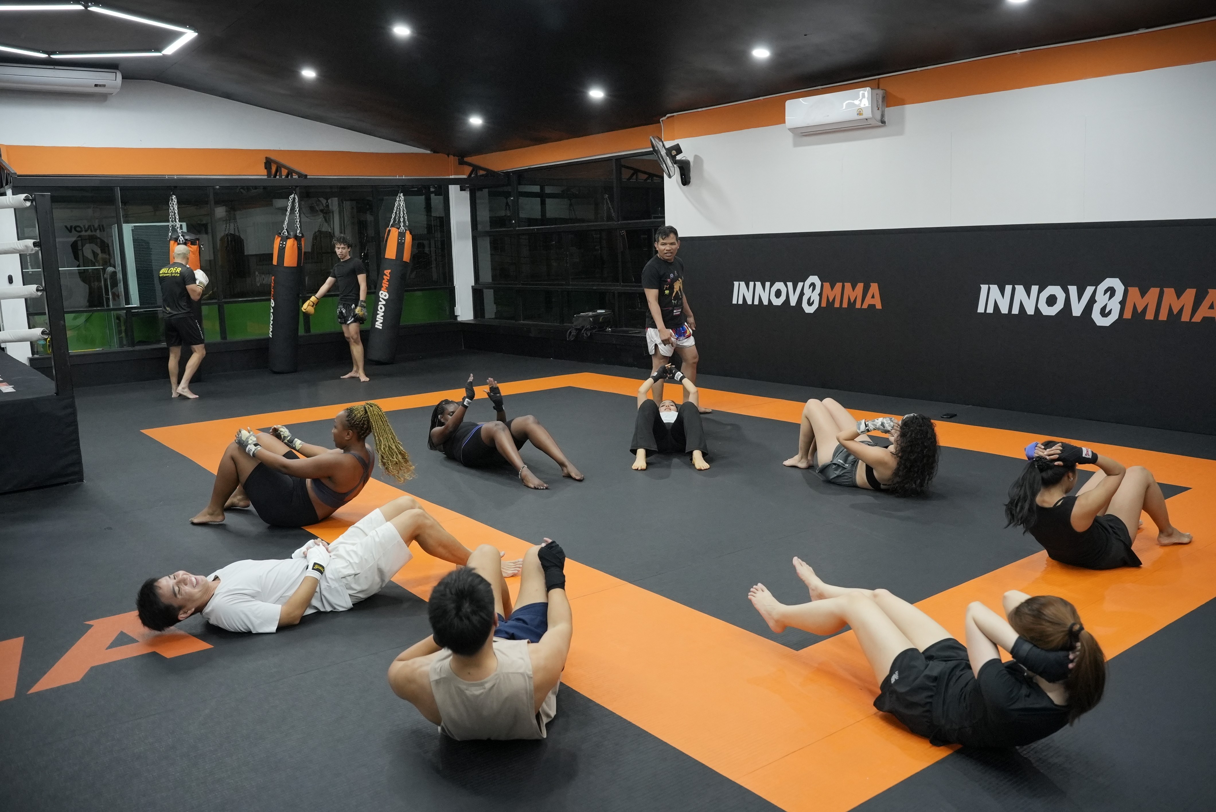 Group of professionals training at INNOV8 MMA