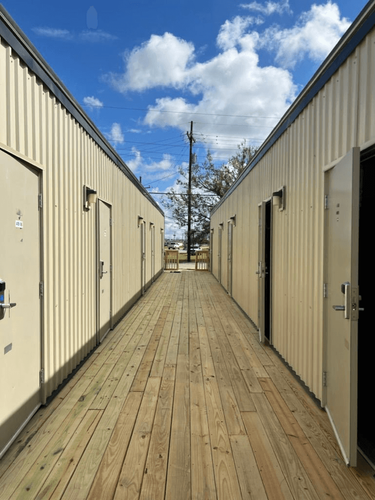 Covered boardwalk between modular housing units at the Ochsner Chabert emergency housing site.