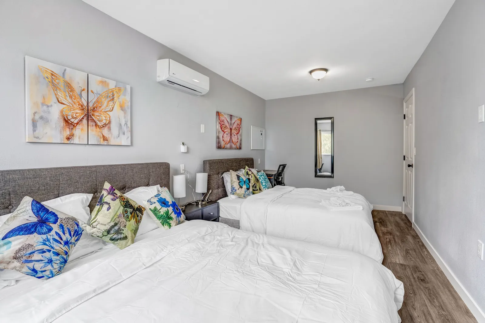 Bedroom with two queen beds and butterfly art, Big Groups Retreat in North Las Vegas