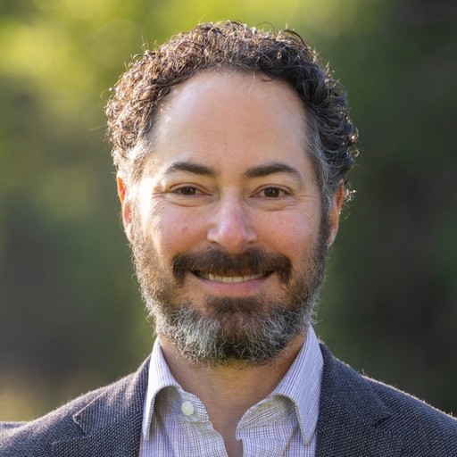 A man smiling for a photo