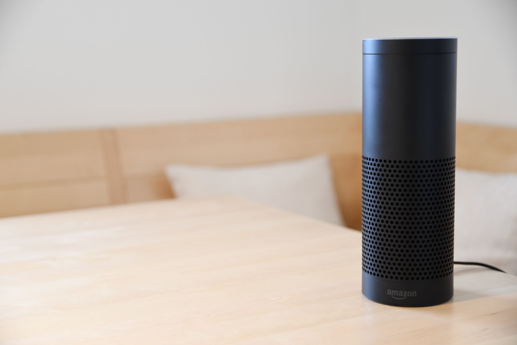 Amazon smart speaker sitting on a table