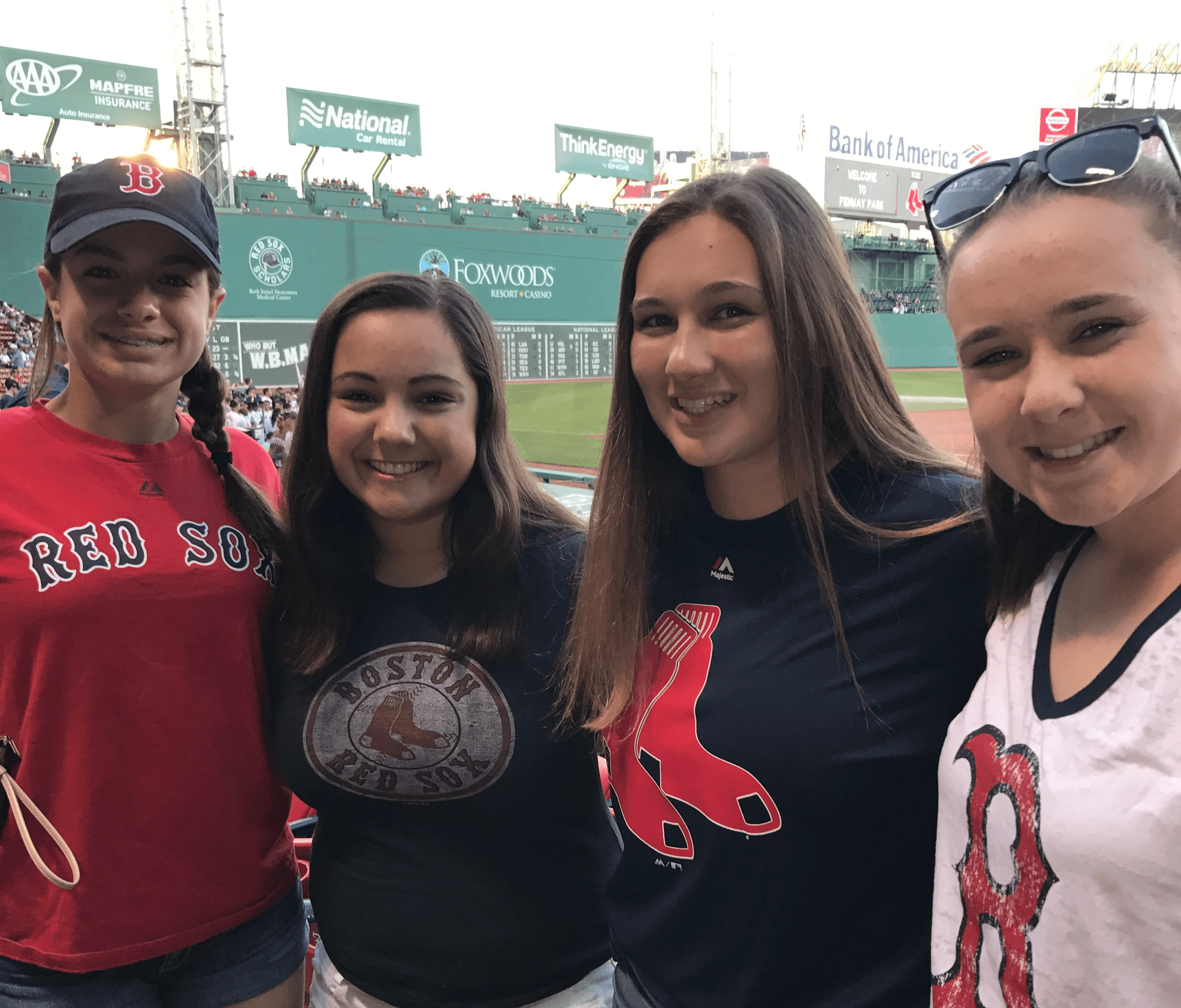 Group Taking a Selfie at a Concert Venue
