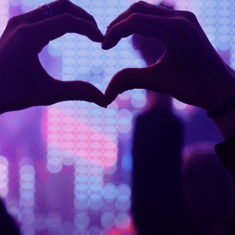 TWO HANDS MAKING THE SHAPE OF A HEART