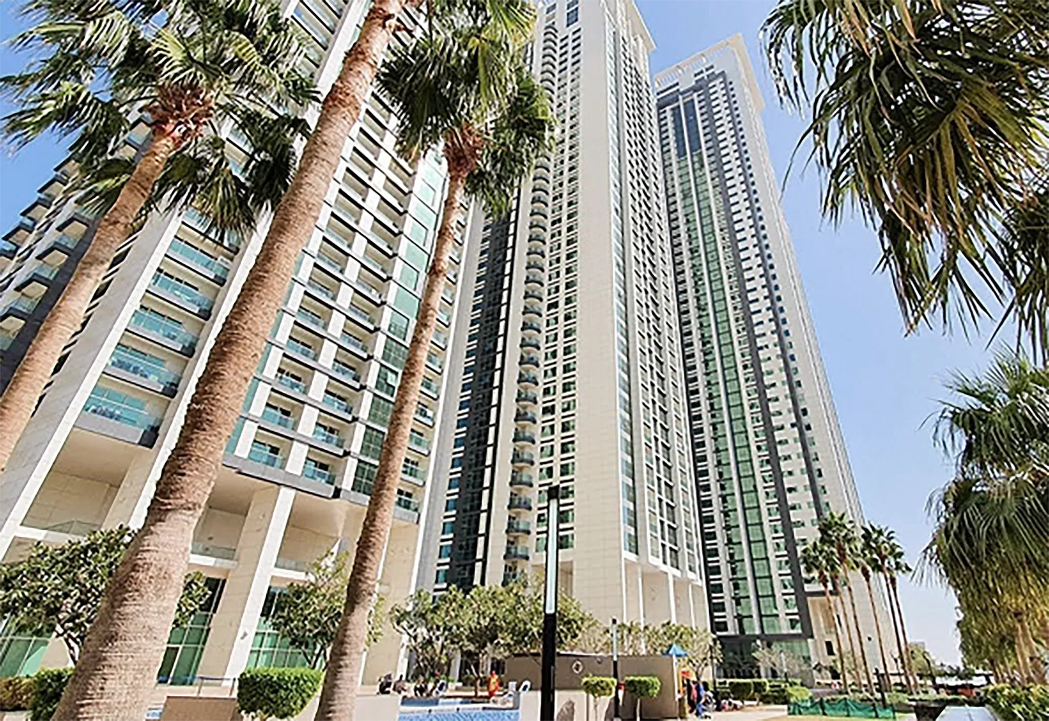View on Dubai skyscrapers with palms.