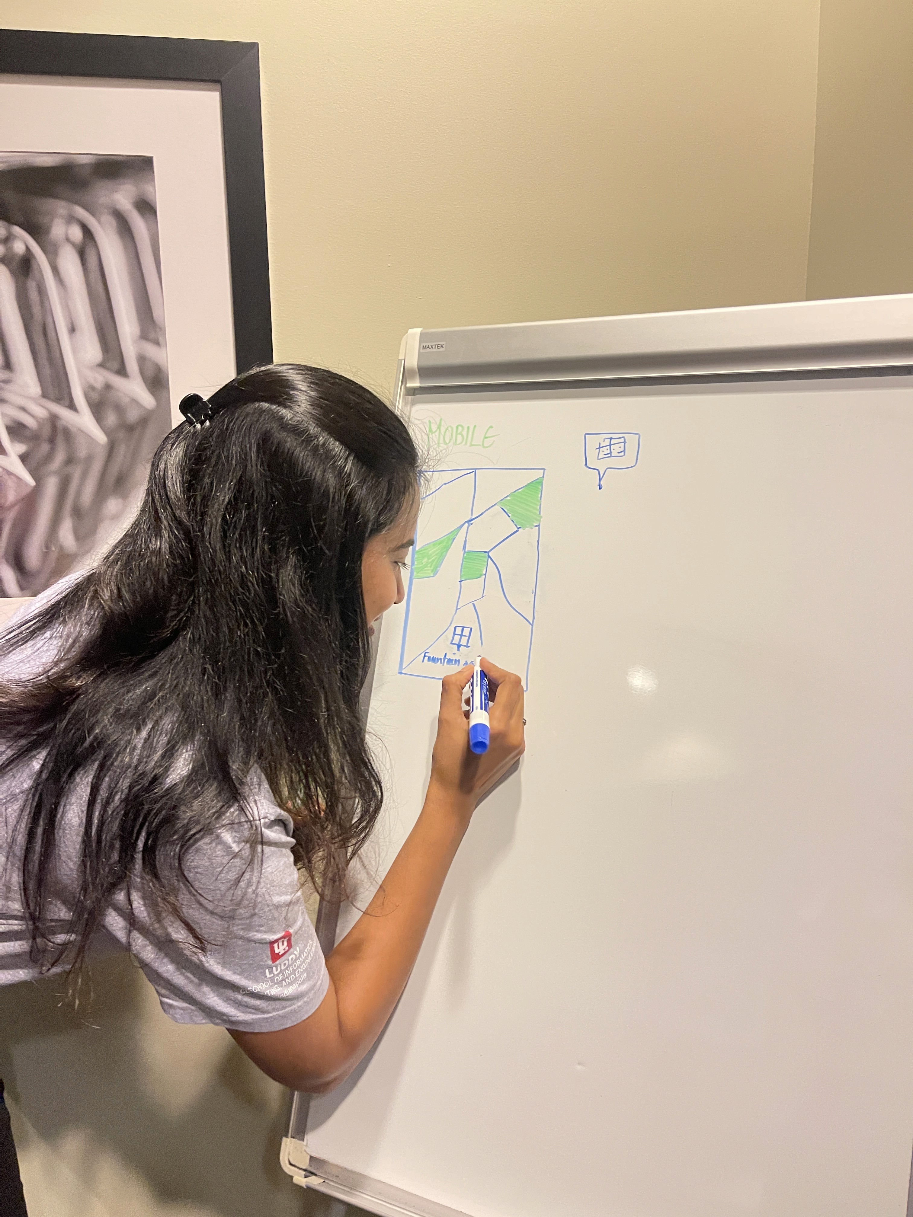 Nadina working quietly in front of a computer