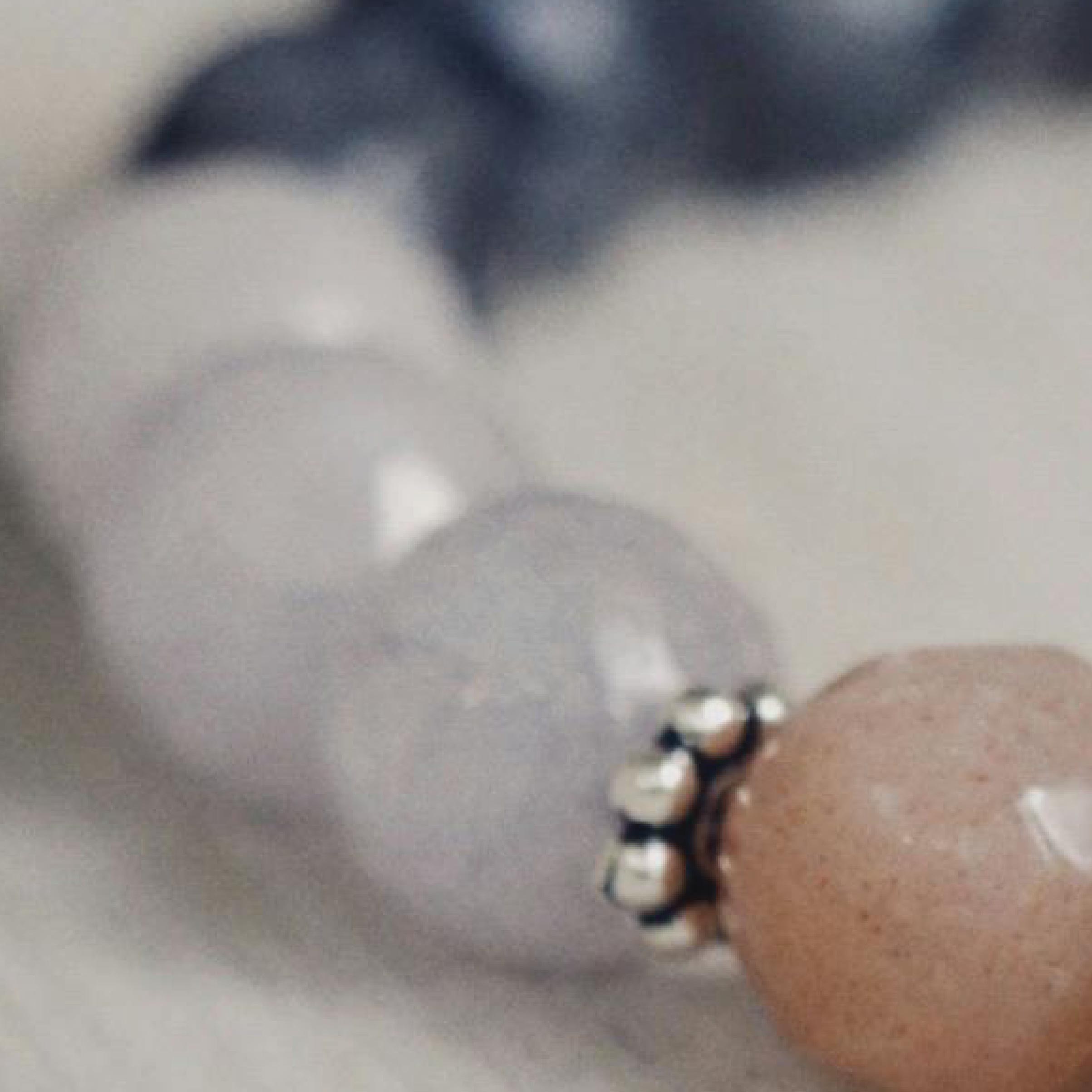 Streetside billboard with flyposters of the Batch.Works brand and illustrations