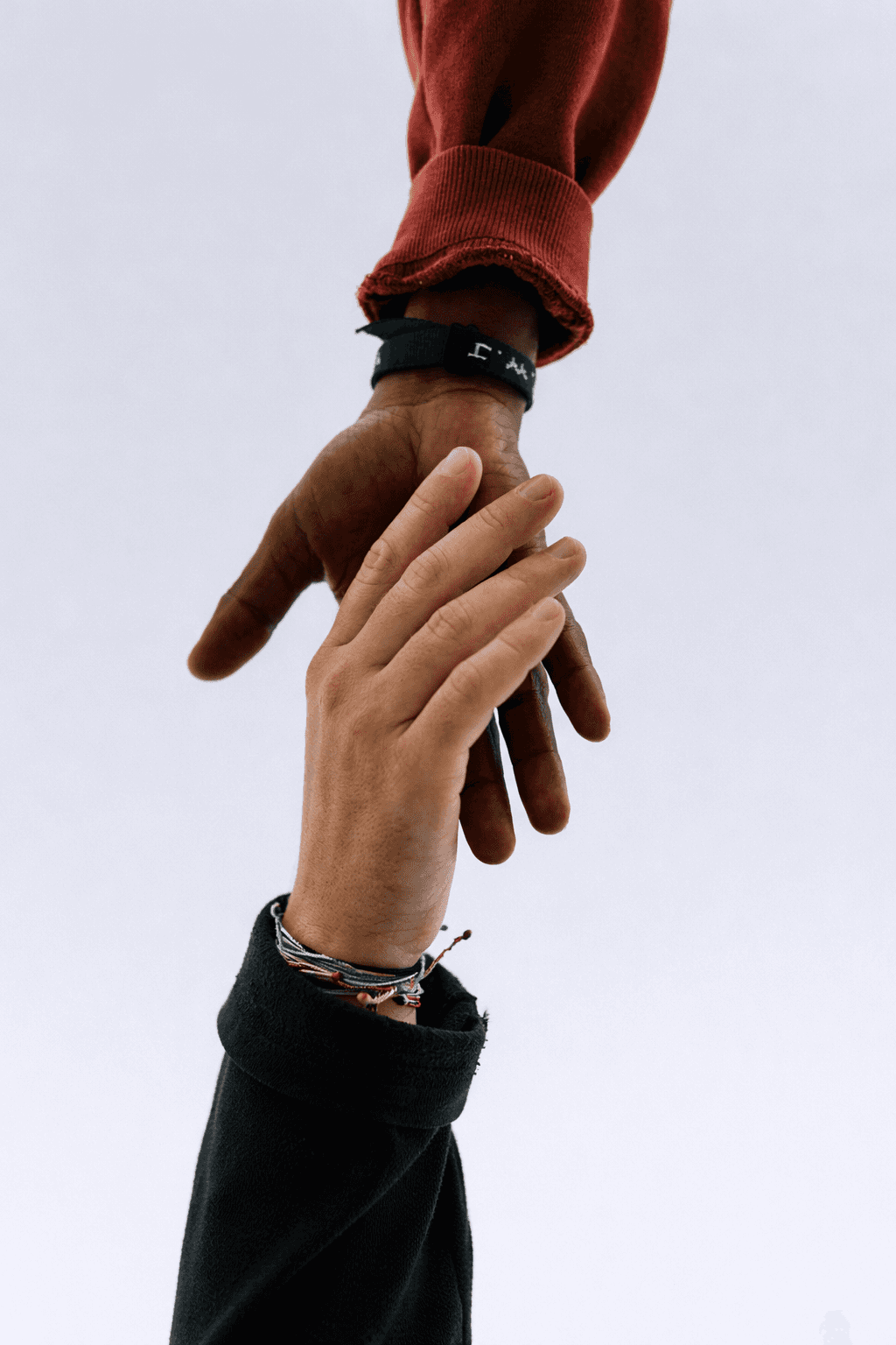 view of two persons hands