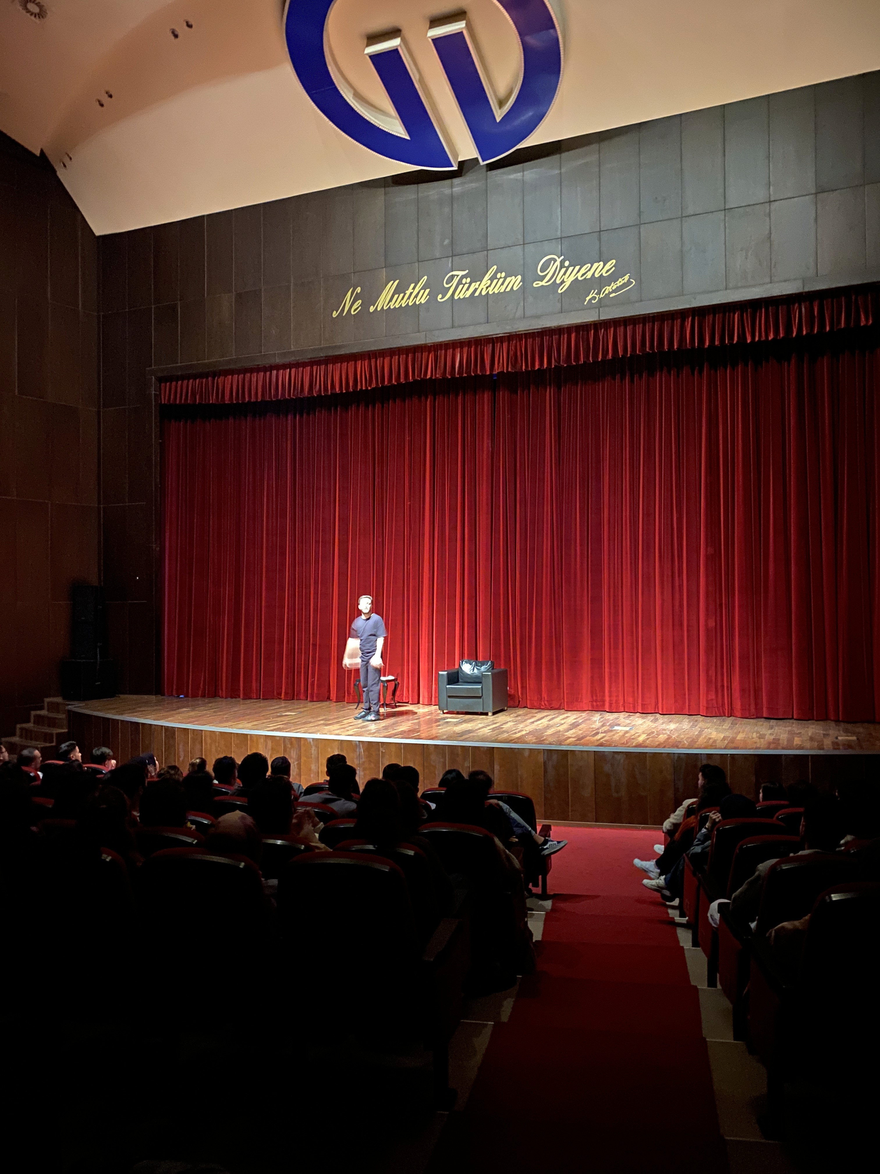 Woman talking to a Man using Mic