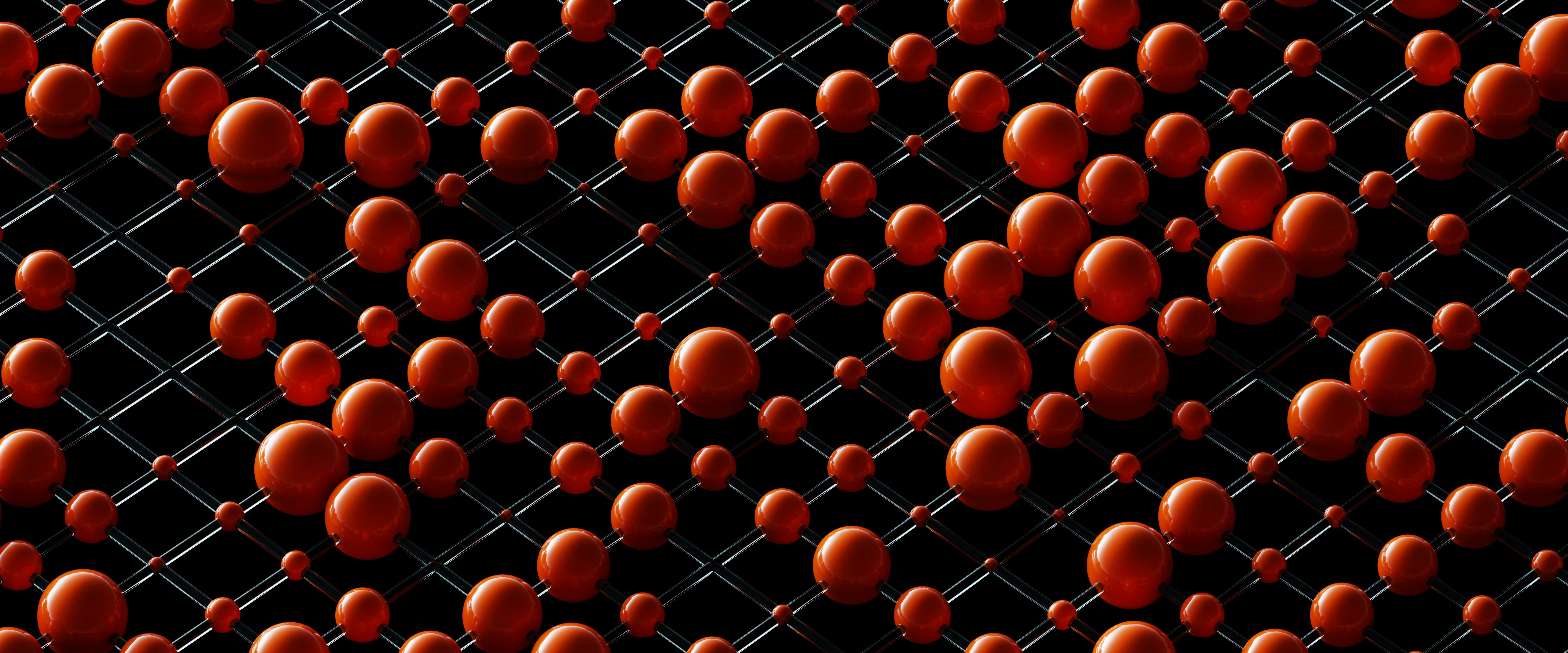 Red spheres arranged on a black grid pattern