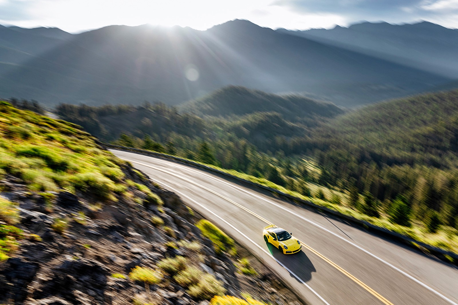 driving Porsche in the mountains