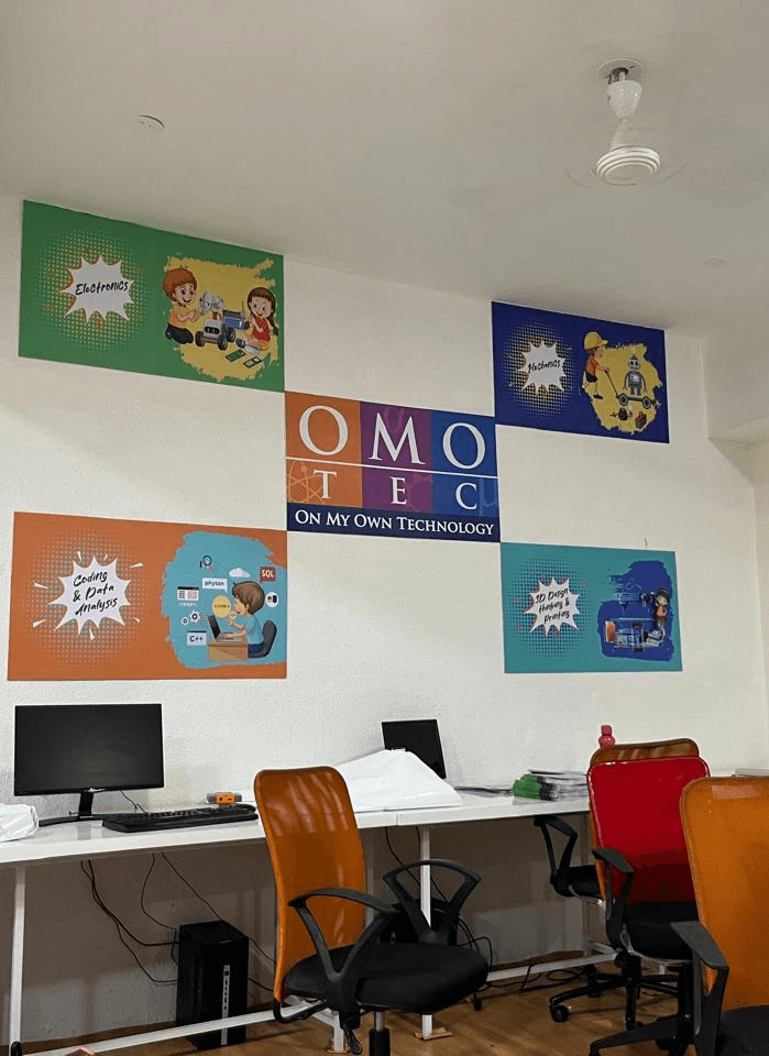 green chairs under umbrellas on shore