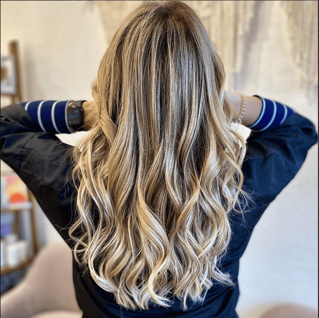 Lived-in blonde balayage with weft extensions by Tannya Speir at Del Sol Hair Studio Huntington Beach