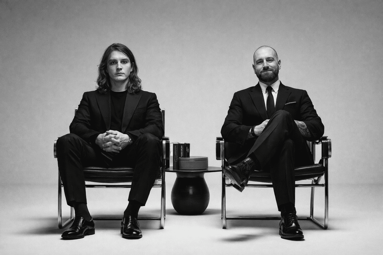 man and woman both laughing by tree during daytime