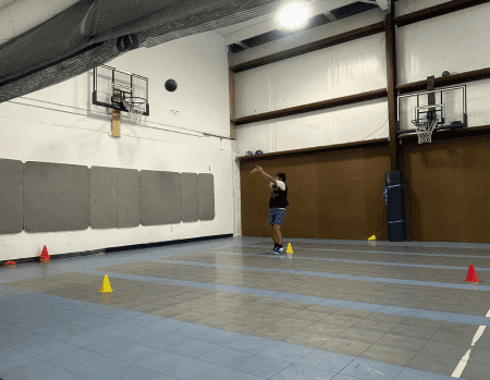 SportPlus Basketball student running a basketball shooting drill at our gym in Charlotte, NC 