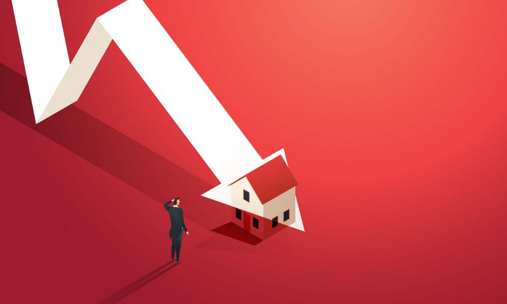Falling house market with businessman.