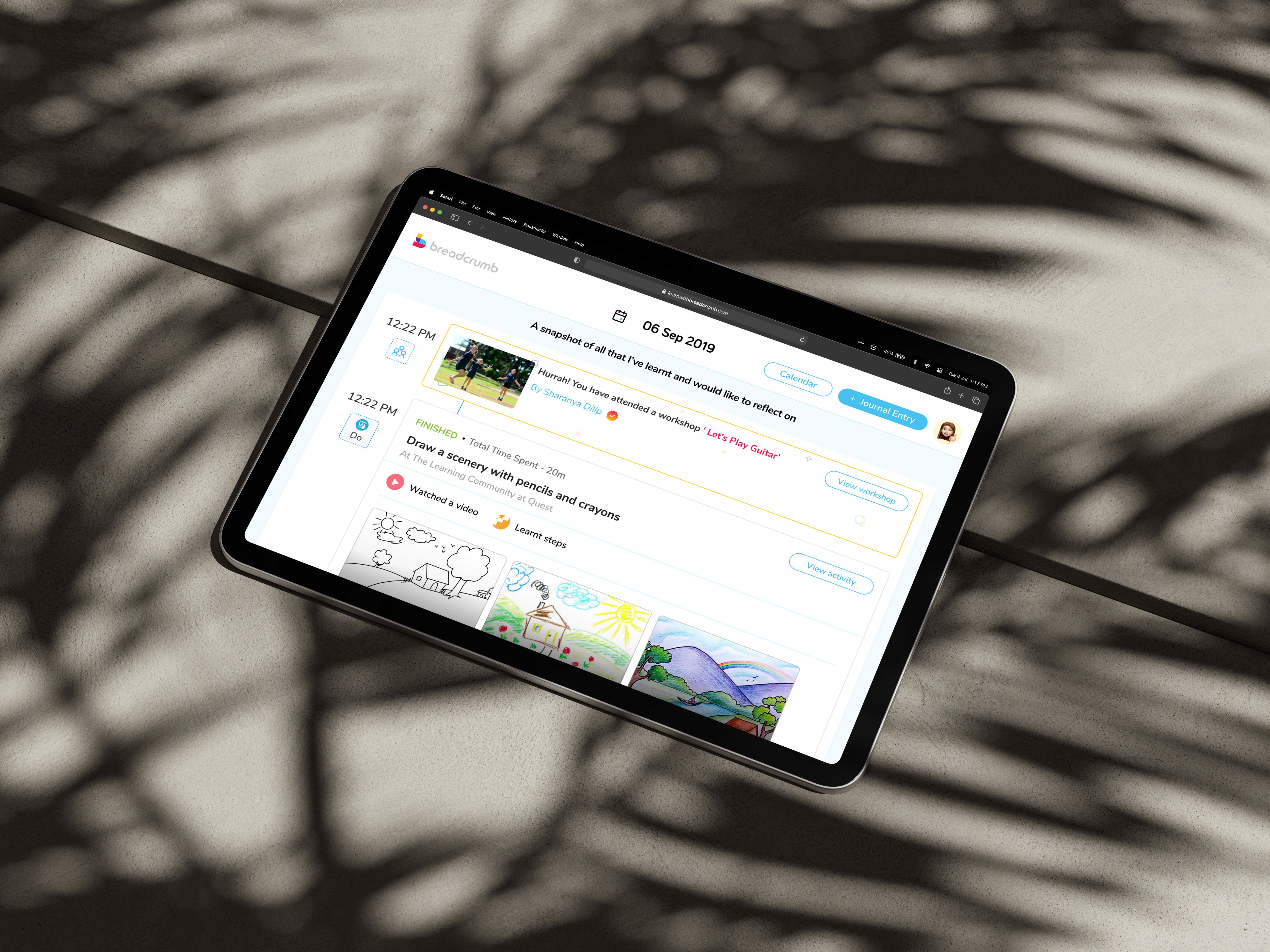 Tablet view of a journal entry showing student activity, drawing task, and progress updates.