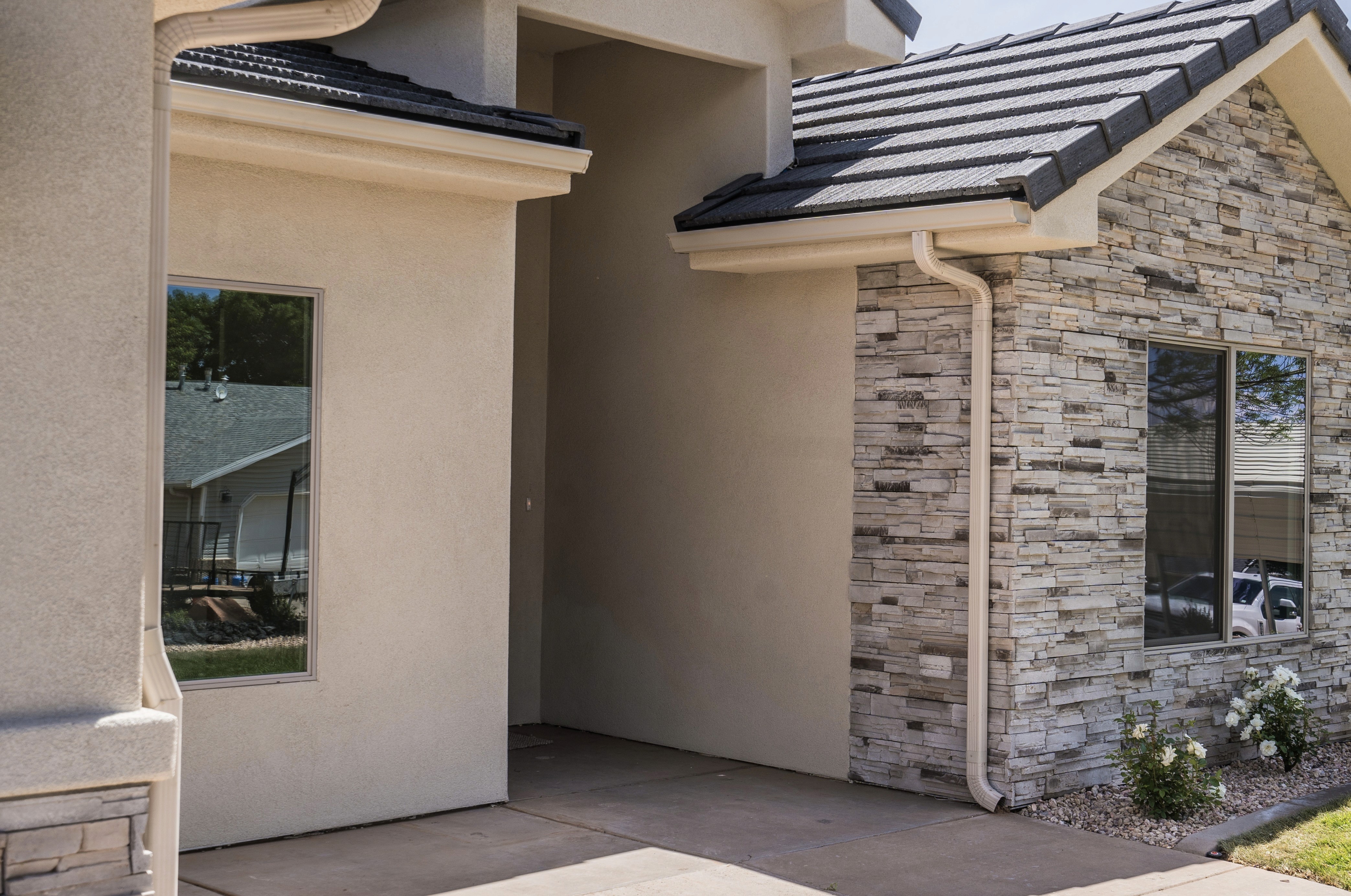Angle view of a Hurricane, Utah home remodel with modern desert-inspired exterior design.