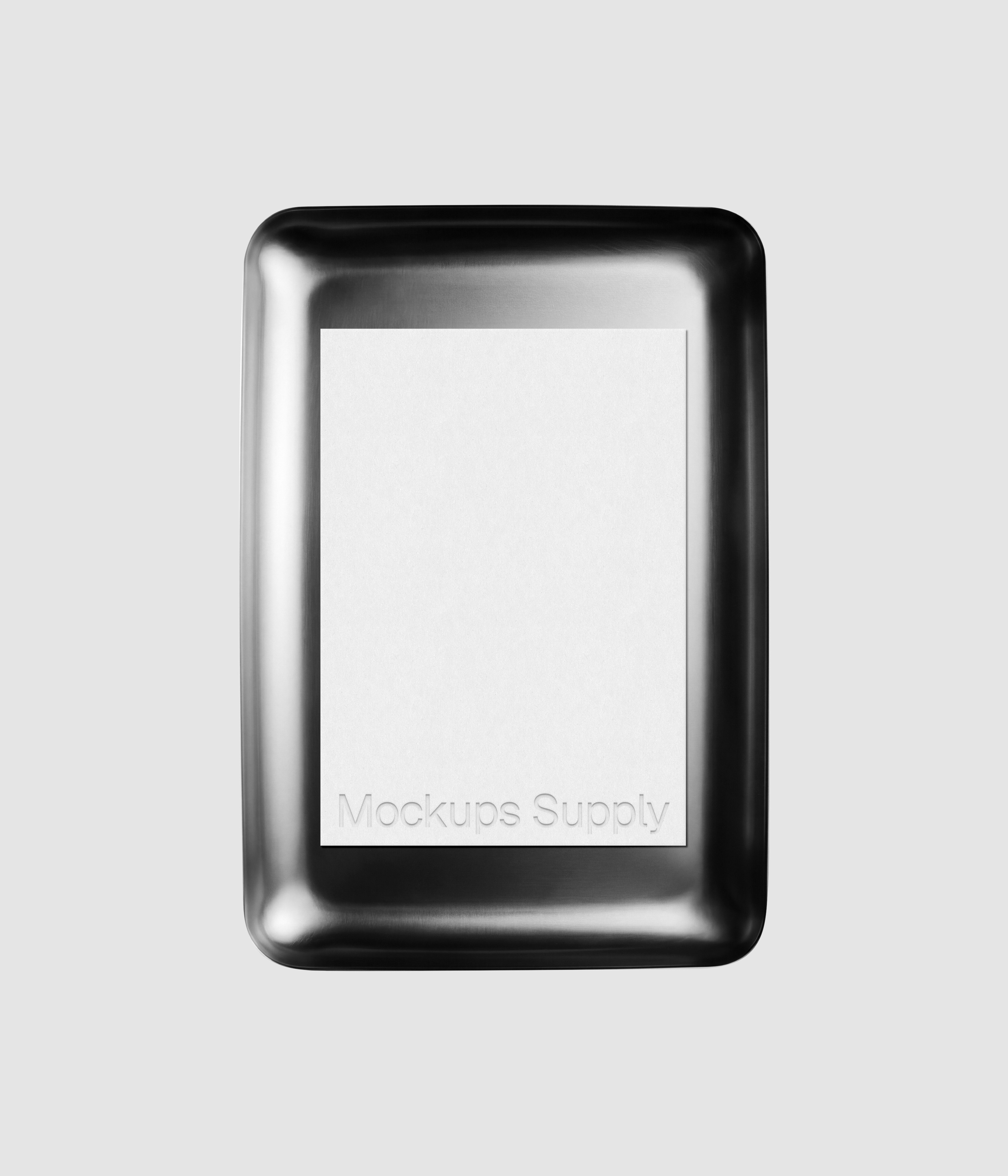 Paper mockup with embossed typography on clean metal plate for logo design and identity showcase
