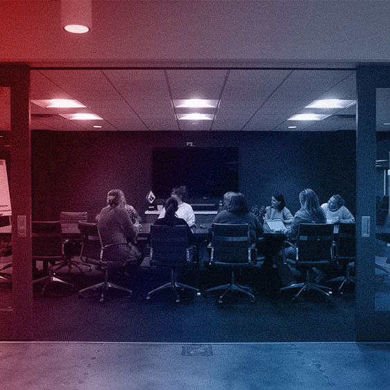 WTADS full conference room mtg with red blue gradient overlay.