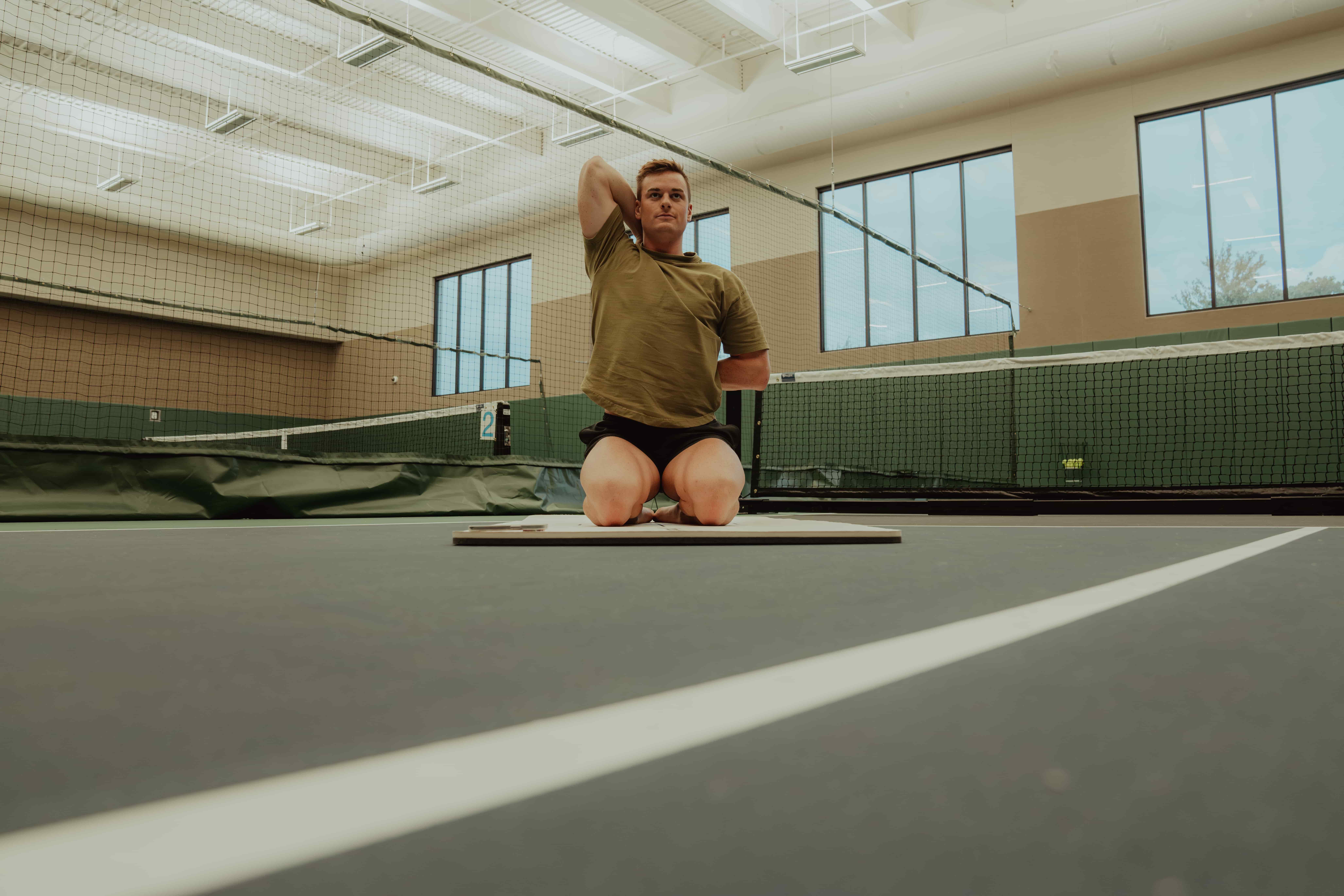 Man Stretching Indoors - Back Mobility Exercises