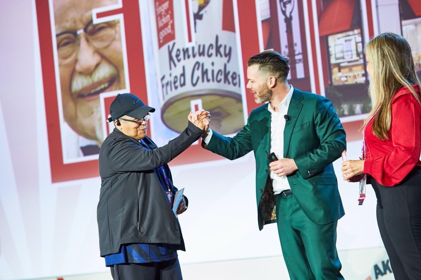 A person giving a high five to another person

Description automatically generated