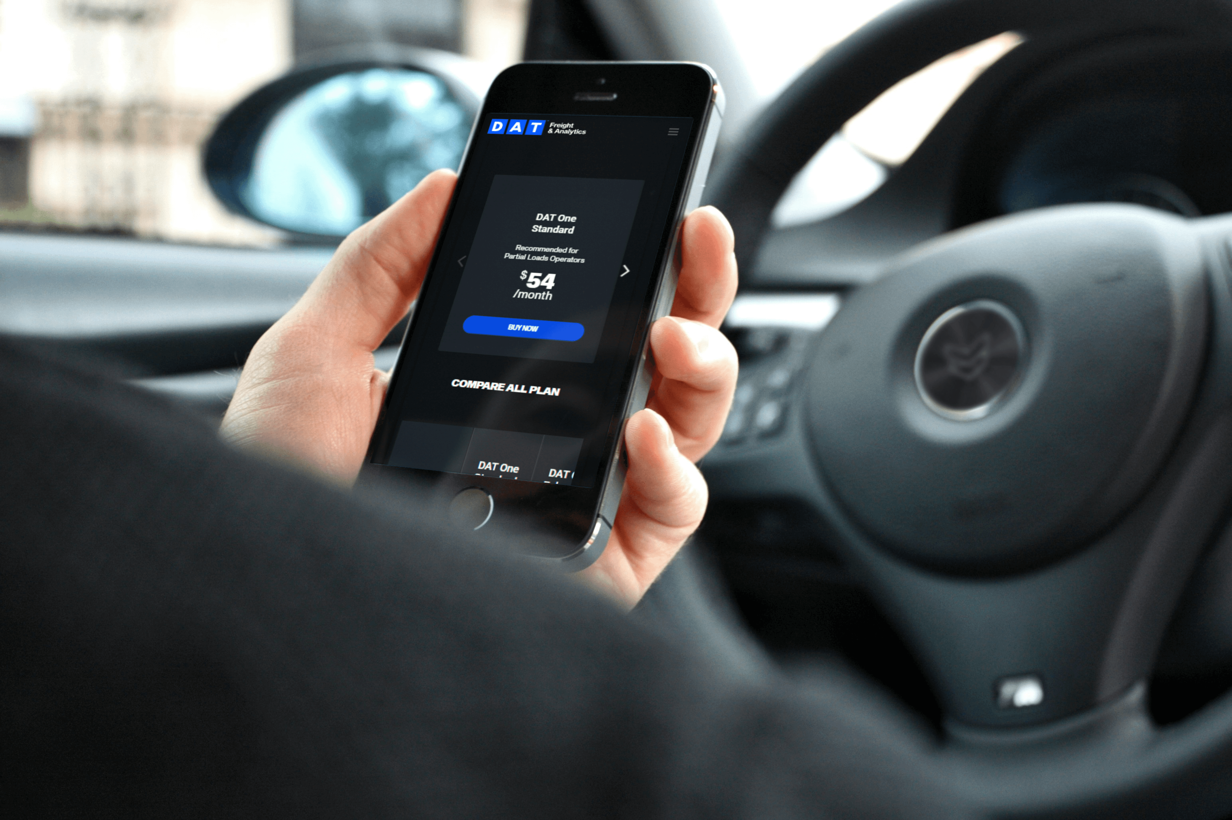 a cell phone leaning on boxes