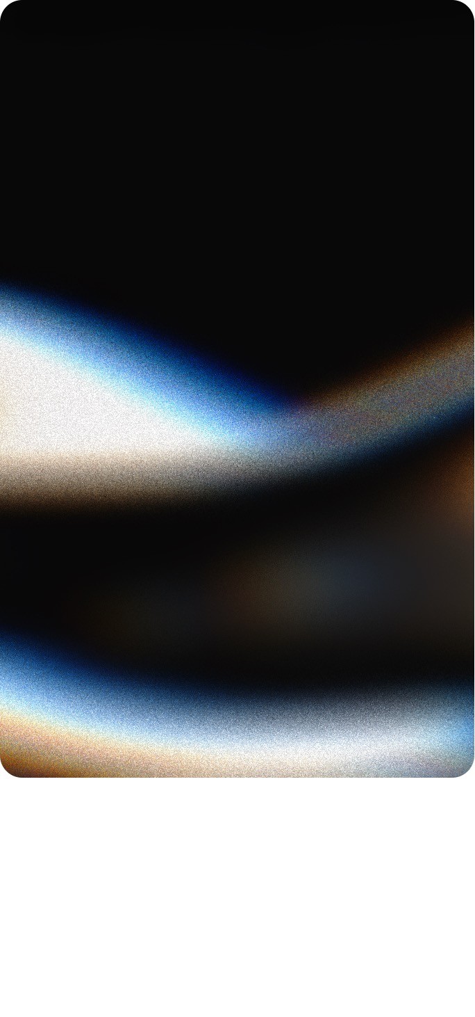 Abstract black and white image of flowing smoke-like shapes against a dark background.