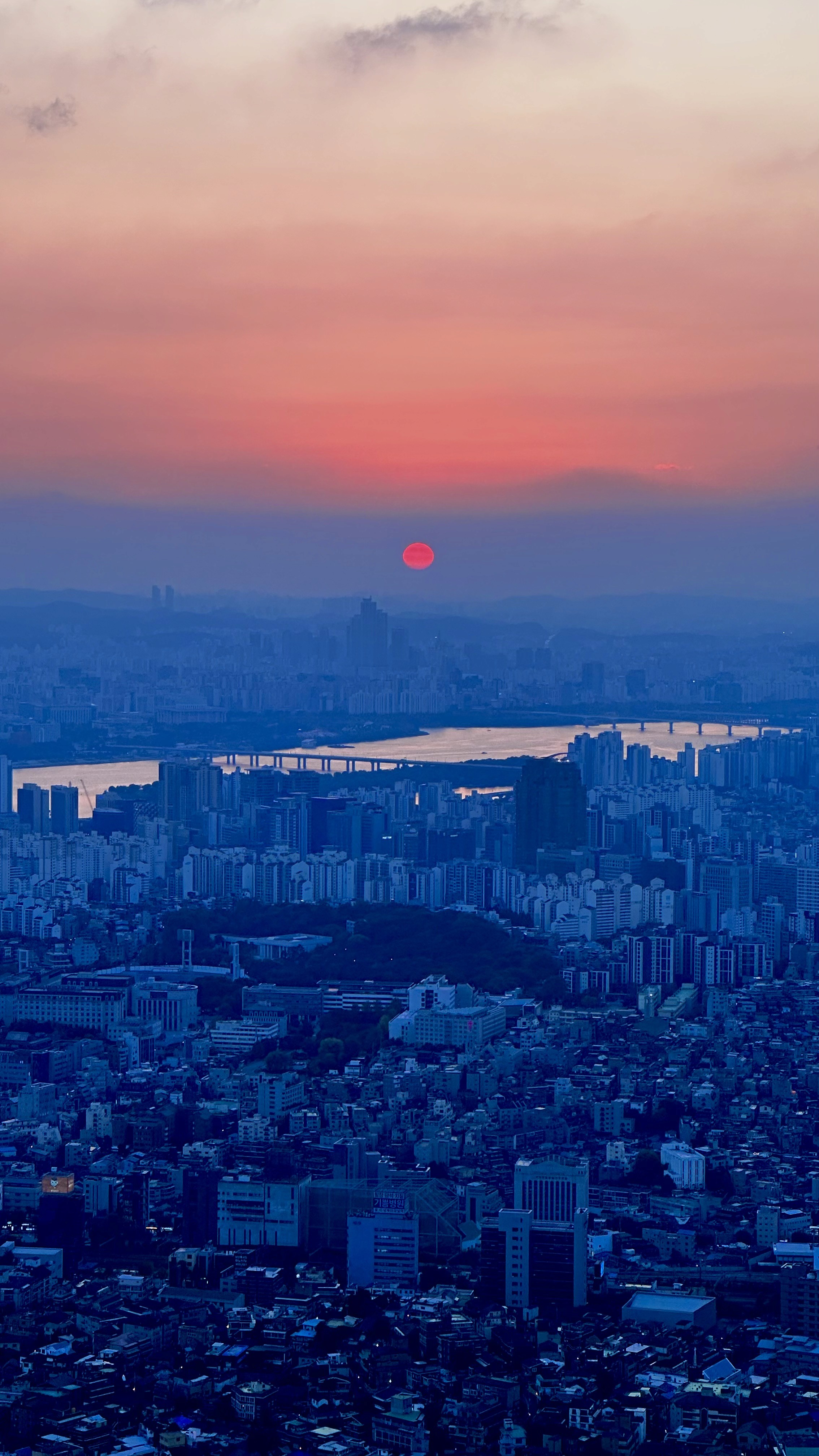 people in a large building with Tate Modern in the background