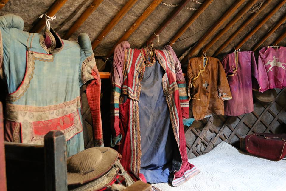 Inside of Mongolian Ger or Yurt with traditional clothing