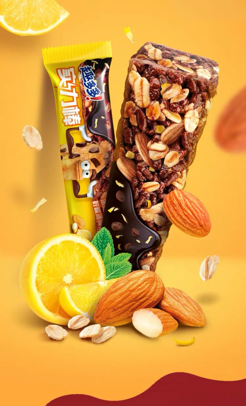 A chocolate bar showing ingredients like lemon, almonds on yellow background.