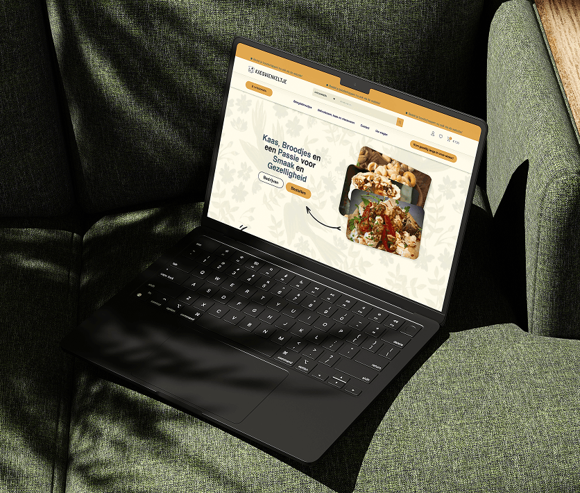 A red hot air balloon glows at sunset over mountains.