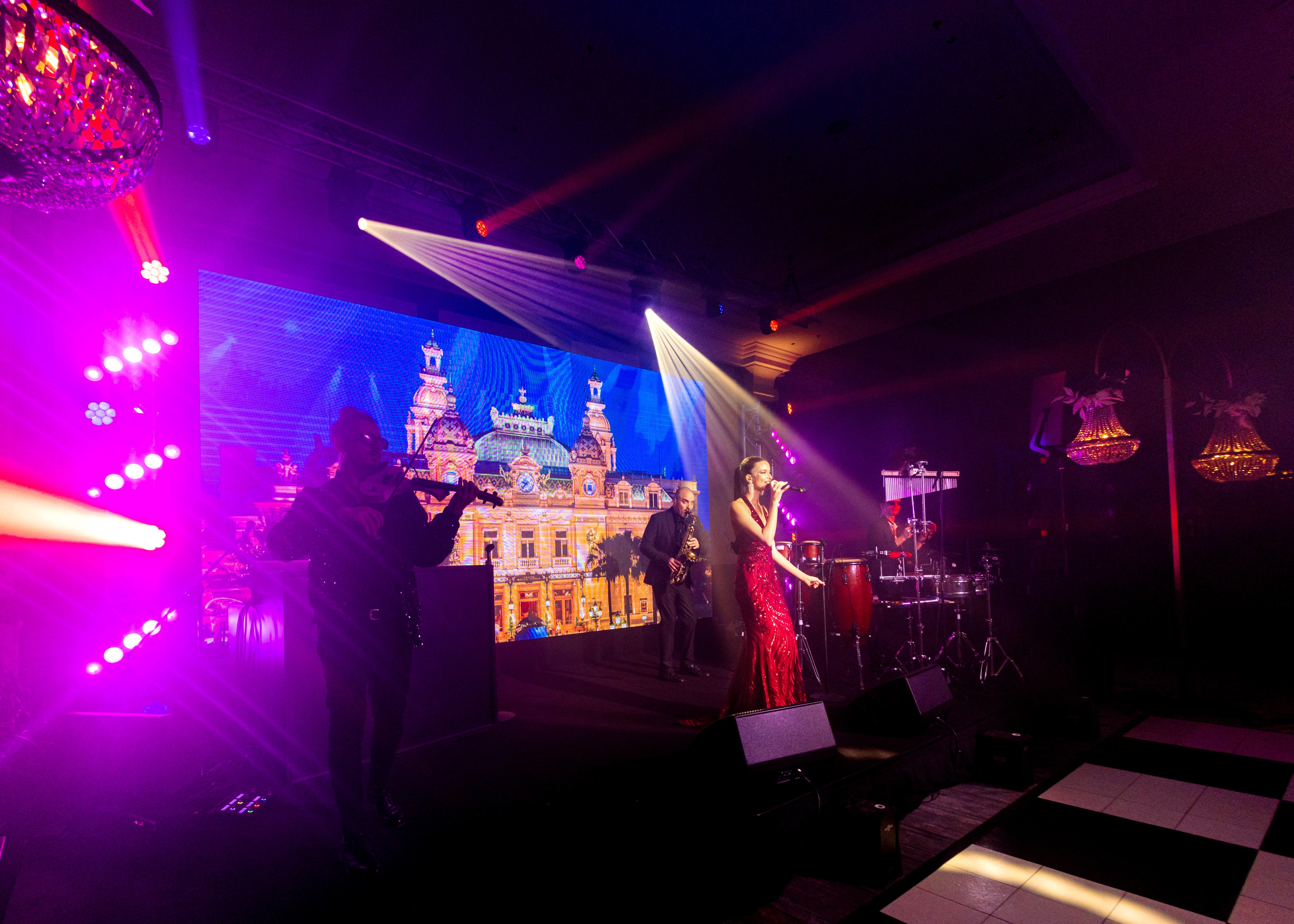 a woman holding a red flower