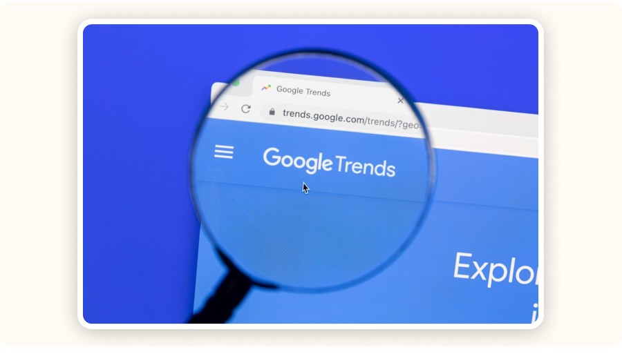 Google Trends interface with magnifying glass