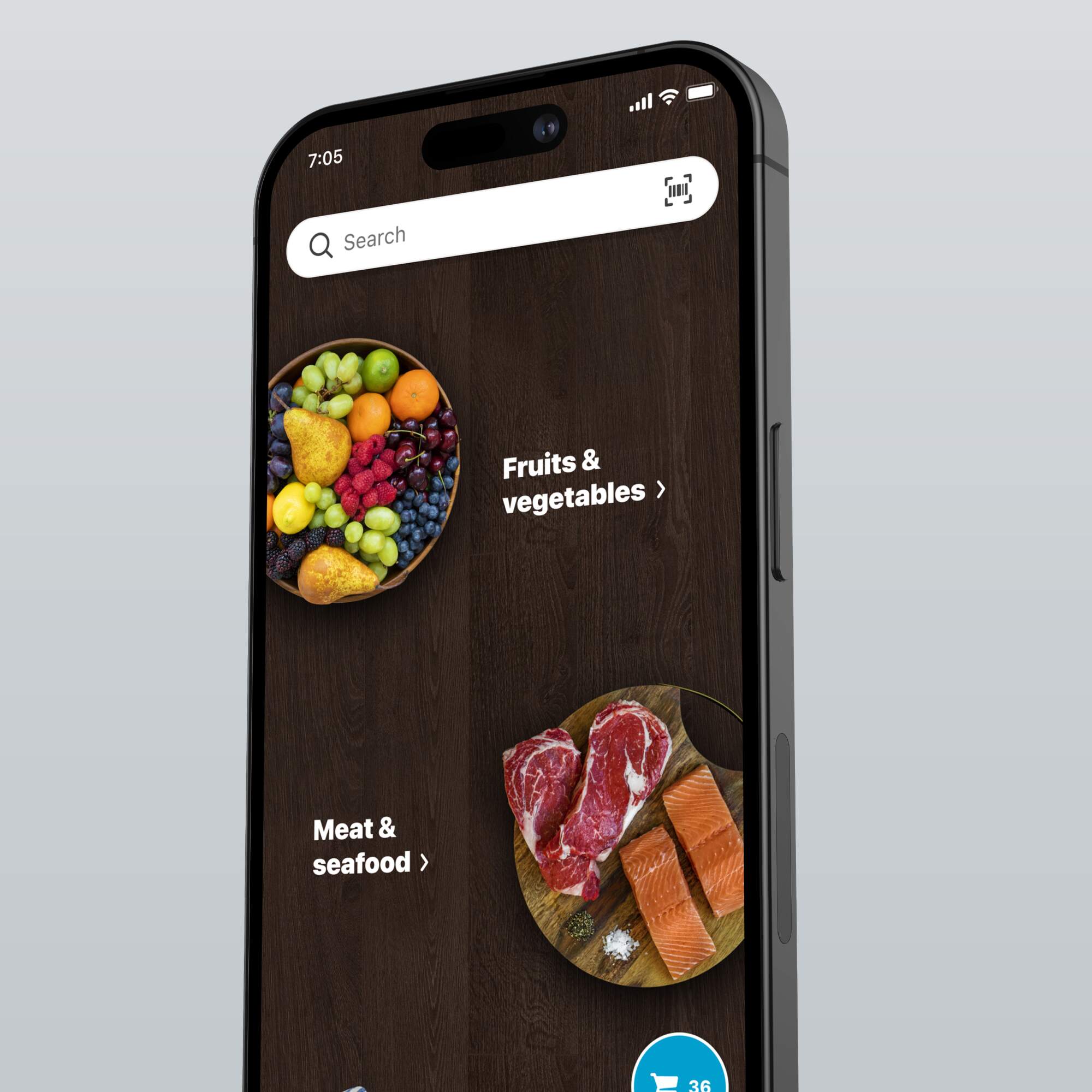 A smartphone displaying the H-E-B app with categories for fruits & vegetables and meat & seafood.