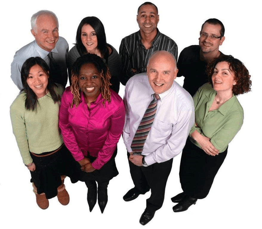 People posing together in a studio photo.