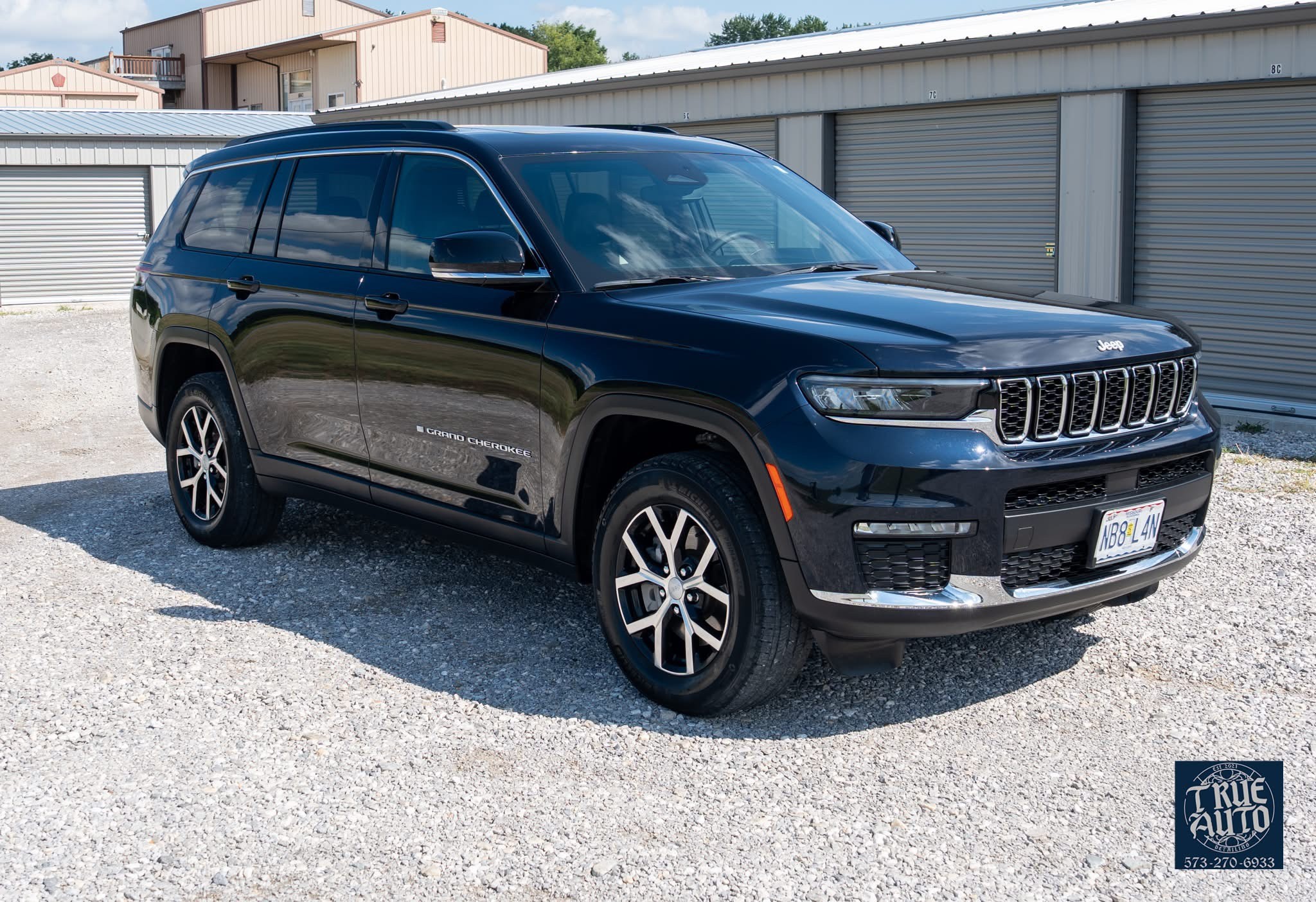 Blue car outdoors on a sunny day