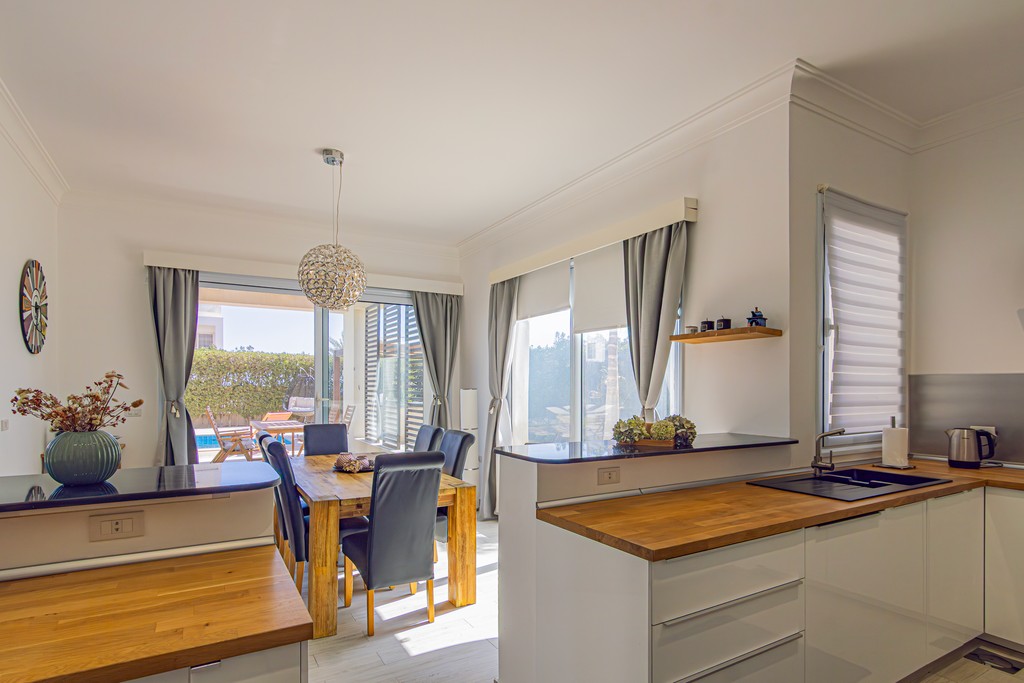 black and white wooden table and chairs