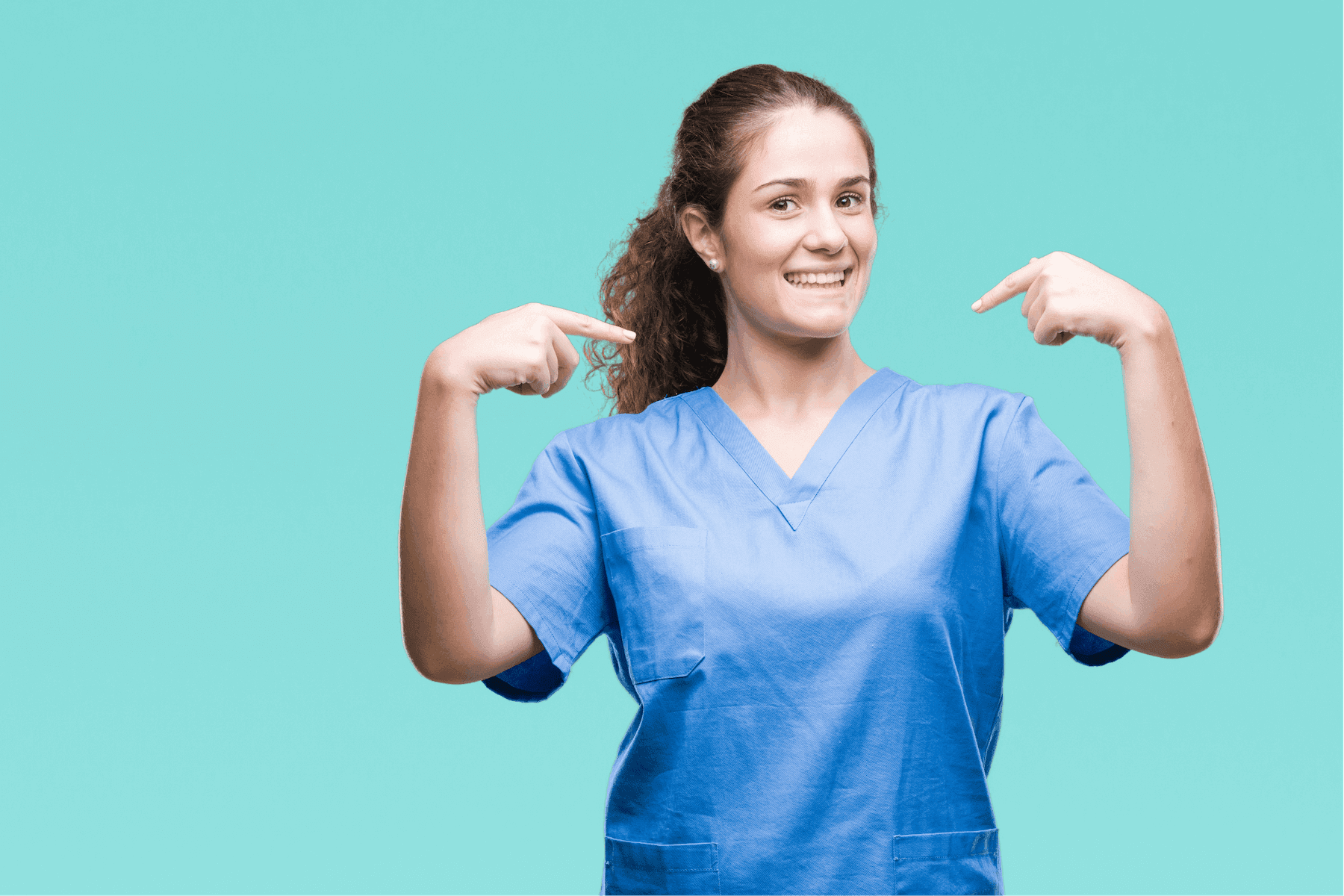 Smiling healthcare worker in scrubs pointing at herself on an aqua background