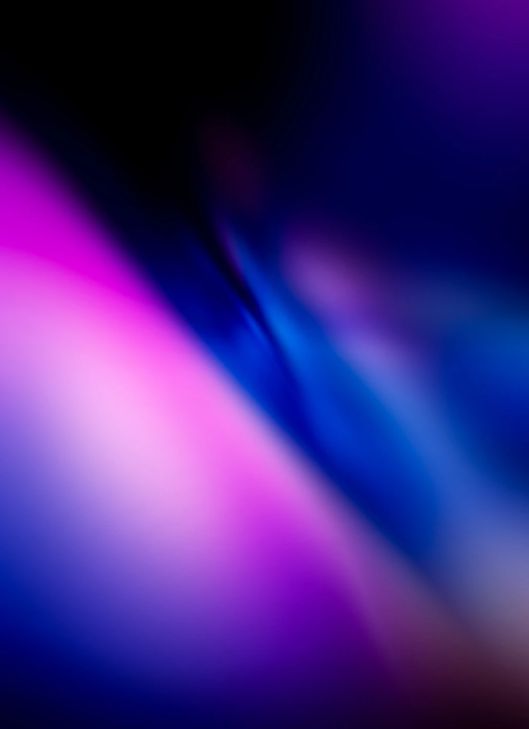 rainbow prism light spectrum on dark surface