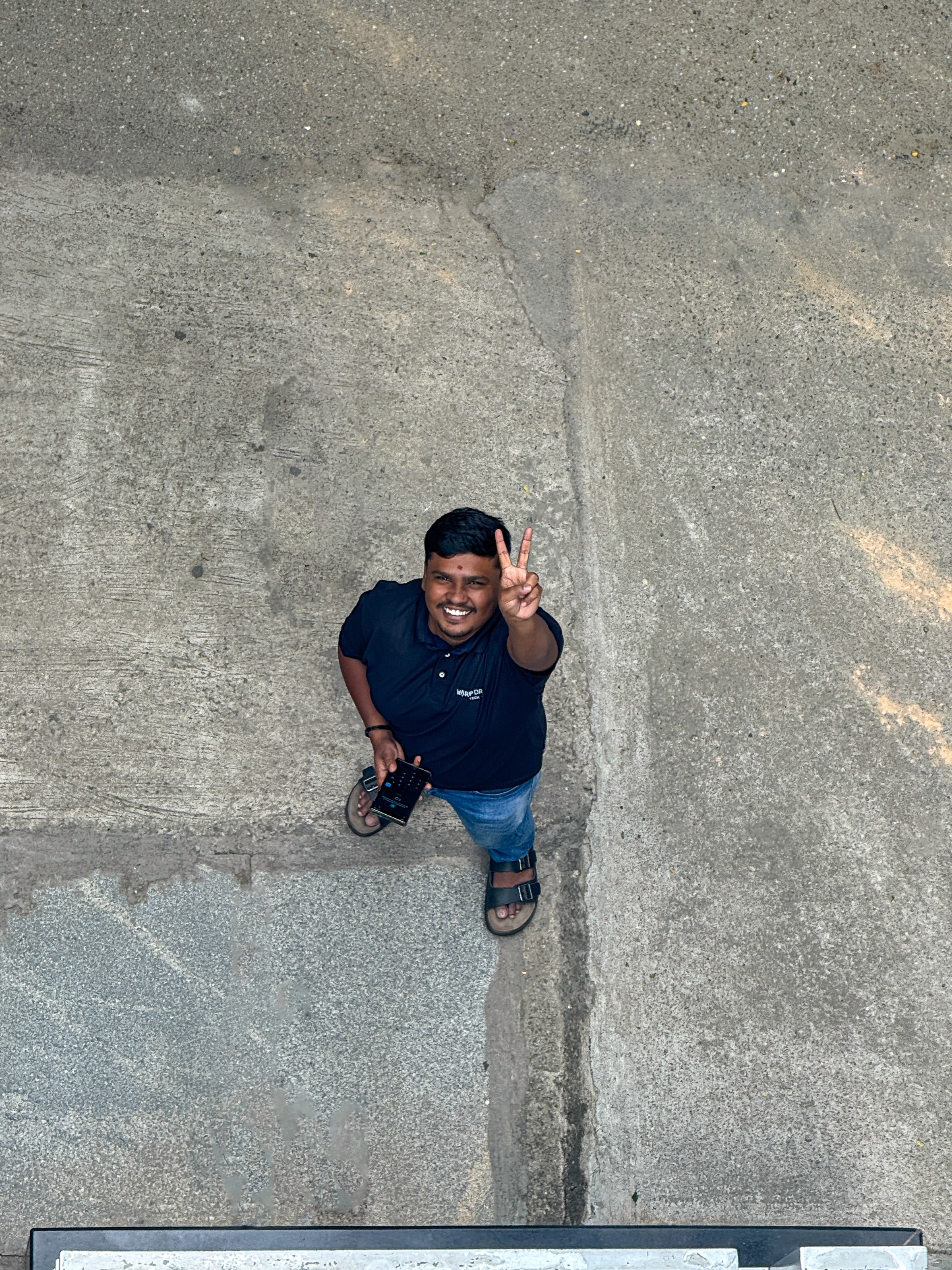 a japanese style building with a japanese roof and trees around it