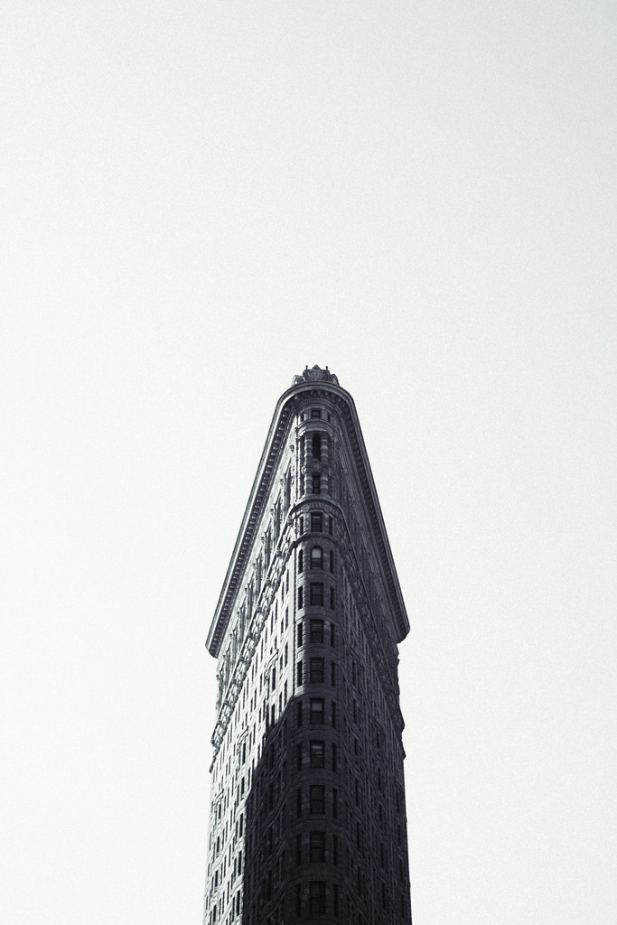 black white image showing the top part of the flat iron building.