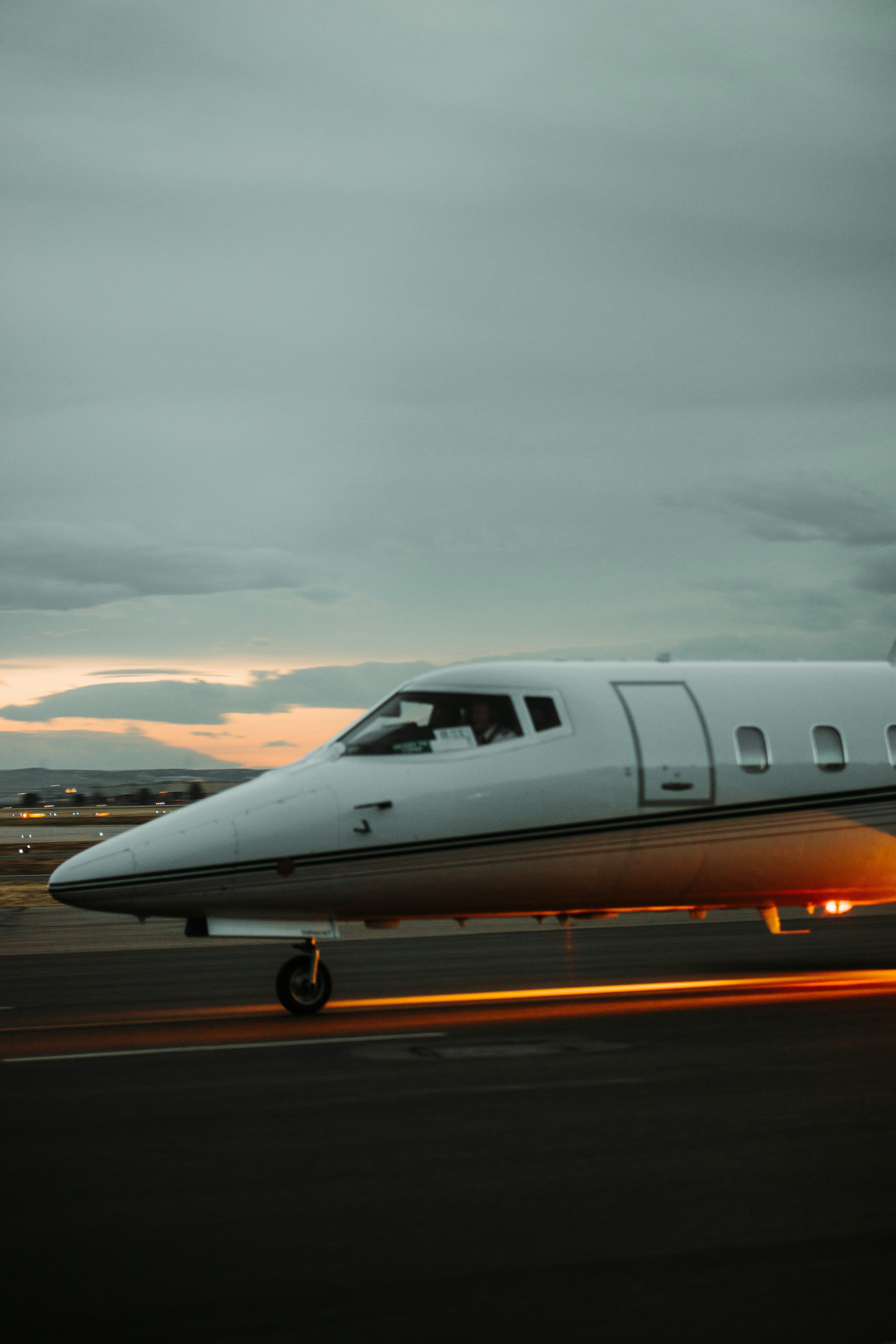 white airplane on airport during daytime
